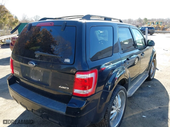 2009 Ford Escape XLT with VIN 1FMCU93G49KD15671, listed as a IAAI auction lot 41751527 with 208,697 mi miles. Bid and sale history available at carsss.com. Image 4.