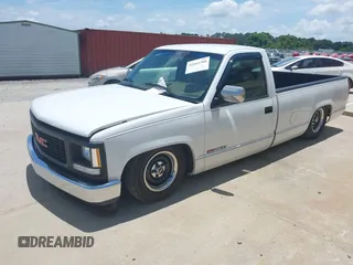 1994 GMC Sierra 1500 z VIN 1GTFC24KXRE522028, wystawiony jako IAAI lot #42463380 z przebiegiem 153 411 mil mil oraz . Historia ofert i sprzedaży dostępna na DreamBid. Obrazek 2.