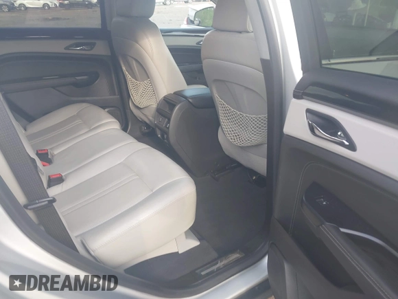 2015 Cadillac SRX Luxury Collection with VIN 3GYFNBE3XFS612048, listed as a IAAI auction lot 41923525 with 154,621 mi miles. Bid and sale history available at carsss.com. Image 8.