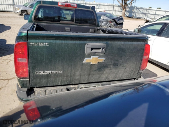 2015 Chevrolet Colorado 4WD Z71 with VIN 1GCGTCE3XF1251671, listed as a Copart auction lot 42787115 with 55,778 mi miles and Salvage Title. Bid and sale history available at carsss.com. Image 6.