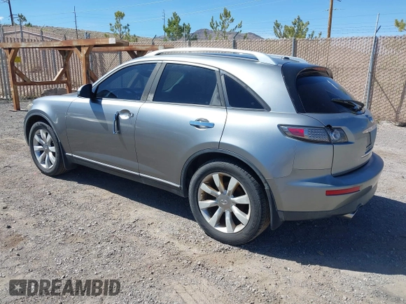 2005 Infiniti FX z VIN JNRAS08W45X218545, wystawiony jako IAAI lot #41904209 z przebiegiem 223 649 mil mil oraz . Historia ofert i sprzedaży dostępna na DreamBid. Obrazek 3.