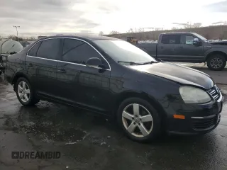 2009 Volkswagen Jetta Sedan SE with VIN 3VWRM71K09M141243, listed as a Copart auction lot 51507365 with 154,474 mi miles and Salvage Title. Bid and sale history available at carsss.com. Image 4.