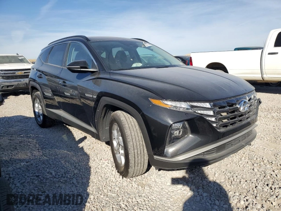 2022 Hyundai Tucson SEL with VIN 5NMJBCAE5NH030189, listed as a Copart auction lot 75327374 with 33,864 mi miles and Salvage Title. Bid and sale history available at DreamBid. Image 4.