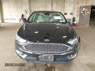2017 Ford Fusion Titanium with VIN 3FA6P0SU3HR268788, listed as a IAAI auction lot 42413877 with 193,561 mi miles and . Bid and sale history available at DreamBid. Image 12.