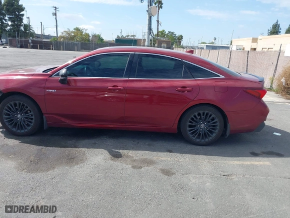 2019 Toyota Avalon Hybrid Limited with VIN 4T1B21FB4KU009762, listed as a IAAI auction lot 41707299 with 156,143 mi miles. Bid and sale history available at carsss.com. Image 15.