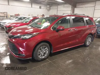 2022 Toyota Sienna XLE with VIN 5TDJRKEC2NS123067, listed as a IAAI auction lot 39982057 with 70,236 mi miles and . Bid and sale history available at DreamBid. Image 2.