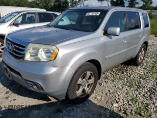 2013 Honda Pilot EX-L with VIN 5FNYF3H56DB020702, listed as a Copart auction lot 62740705 with 295,935 mi miles and Salvage title. Bid and sale history available at DreamBid. Image 1.