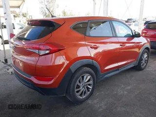 2017 Hyundai Tucson SE with VIN KM8J23A48HU357394, listed as a IAAI auction lot 41841968 with 74,769 mi miles. Bid and sale history available at carsss.com. Image 4.