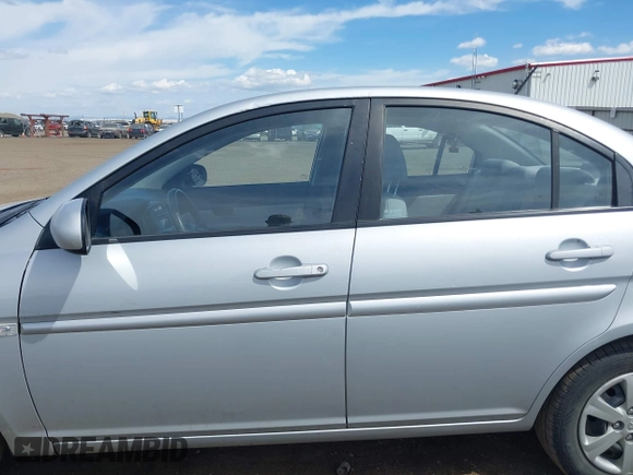 2010 Hyundai Accent GLS with VIN KMHCN4AC1AU476326, listed as a IAAI auction lot 42141297 with 203,607 mi miles. Bid and sale history available at carsss.com. Image 15.