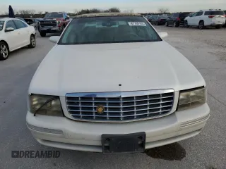 1999 Cadillac DeVille z VIN 1G6KD54Y8XU790082, wystawiony jako Copart lot #87709165 z przebiegiem 112 485 mil mil oraz Czysty tytuł • Clean title. Historia ofert i sprzedaży dostępna na DreamBid. Obrazek 5.