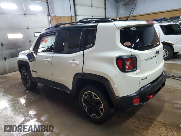 2015 Jeep Renegade Trailhawk with VIN ZACCJBCT0FPC19412, listed as a Copart auction lot 52428395 with 274,497 mi miles and Clean Title. Bid and sale history available at DreamBid. Image 2.