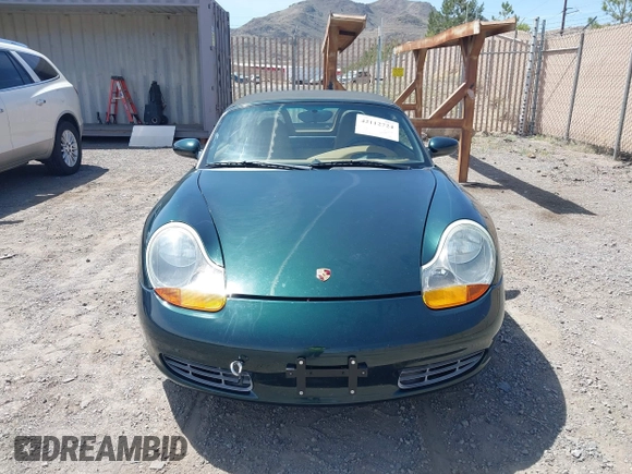 1999 Porsche Boxster with VIN WP0CA2986XU627495, listed as a IAAI auction lot 42112724 with 94,090 mi miles and . Bid and sale history available at DreamBid. Image 6.