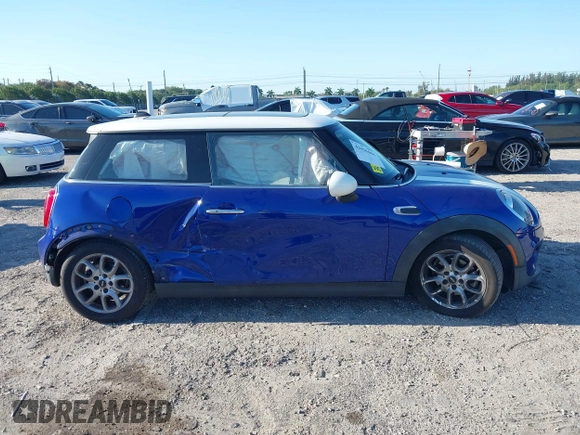 2019 MINI Hardtop Cooper with VIN WMWXP5C52K2H97728, listed as a IAAI auction lot 42026666 with 61,464 mi miles and . Bid and sale history available at DreamBid. Image 13.