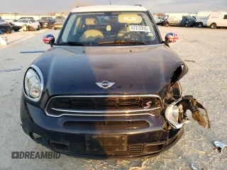 2015 MINI Countryman S with VIN WMWZC5C57FWP48606, listed as a Copart auction lot 47212255 with 104,922 mi miles and Salvage Title. Bid and sale history available at DreamBid. Image 5.