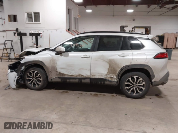 2023 Toyota Corolla Cross Hybrid S with VIN 7MUFBABG0PV004809, listed as a IAAI auction lot 41489550 with 59,172 mi miles and . Bid and sale history available at DreamBid. Image 14.