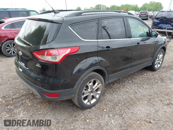 2014 Ford Escape SE with VIN 1FMCU9G9XEUD39077, listed as a IAAI auction lot 42205040 with 92,355 mi miles and . Bid and sale history available at DreamBid. Image 4.
