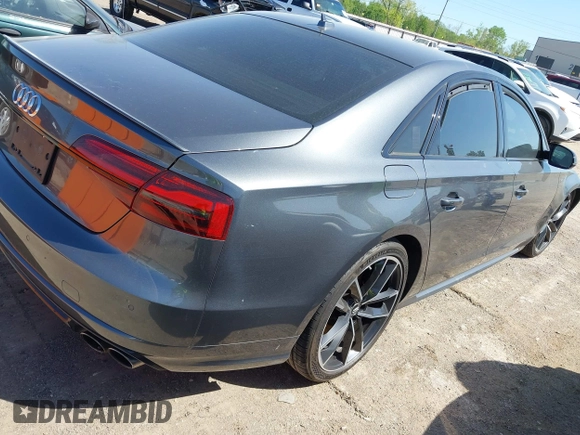 2016 Audi S8 Plus with VIN WUAJ5AFD2GN900596, listed as a IAAI auction lot 42014762 with 1 mi miles. Bid and sale history available at carsss.com. Image 4.