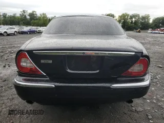 2004 Jaguar XJ with VIN SAJWA71C24SG33915, listed as a Copart auction lot 69626864 with 123,746 mi miles and Non Repairable. Bid and sale history available at carsss.com. Image 6.