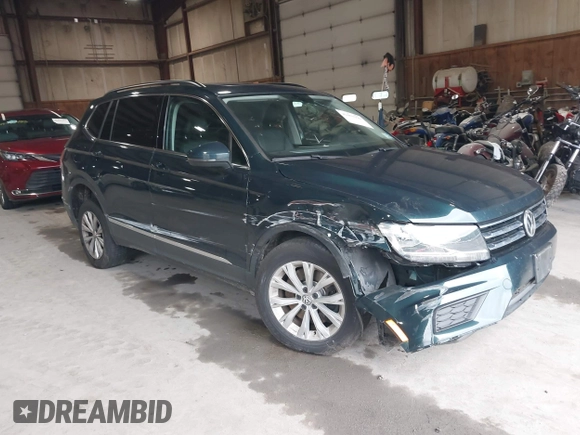 2018 Volkswagen Tiguan SEL with VIN 3VV2B7AX3JM133326, listed as a IAAI auction lot 42459190 with 94,665 mi miles and . Bid and sale history available at DreamBid. Image 1.