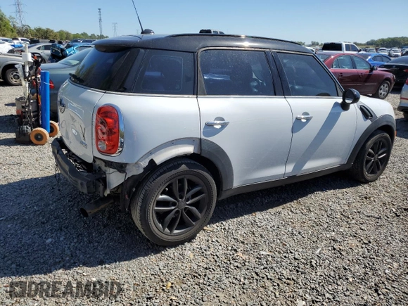 2011 MINI Countryman with VIN WMWZB3C56BWM00040, listed as a Copart auction lot 48660435 with 146,607 mi miles and Salvage title. Bid and sale history available at DreamBid. Image 3.
