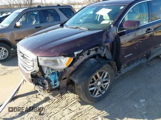 2017 GMC Acadia SLT with VIN 1GKKNMLS6HZ321860, listed as a IAAI auction lot 41679667 with 112,374 mi miles. Bid and sale history available at carsss.com. Image 6.