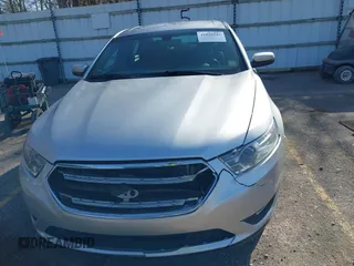 2013 Ford Taurus SEL with VIN 1FAHP2E8XDG191132, listed as a IAAI auction lot 41833542 with 165,125 mi miles. Bid and sale history available at carsss.com. Image 12.
