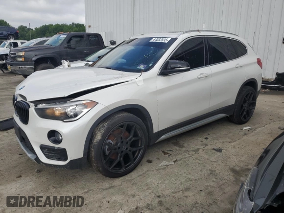 2019 BMW X1 xDrive28i with VIN WBXHT3C52K3H34021, listed as a Copart auction lot 64032535 with 30,752 mi miles and Salvage title. Bid and sale history available at DreamBid. Image 1.