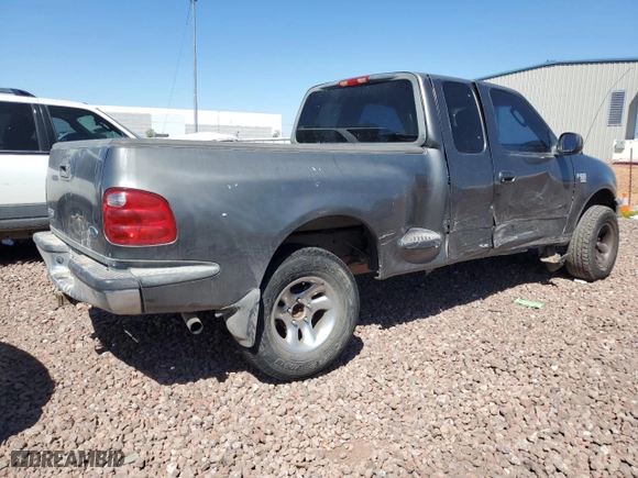 2003 Ford F-150 XL with VIN 1FTRX07WX3KD43808, listed as a Copart auction lot 47951714 with 279,206 mi miles and Salvage Title. Bid and sale history available at carsss.com. Image 3.