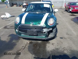 2016 MINI Hardtop z VIN WMWXP5C52G2D13449, wystawiony jako IAAI lot #42337313 z przebiegiem 101 482 mil mil oraz . Historia ofert i sprzedaży dostępna na DreamBid. Obrazek 6.