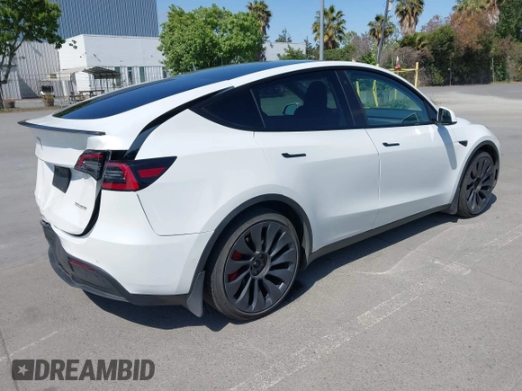 2022 Tesla Model Y Performance z VIN 7SAYGDEF2NF347456, wystawiony jako IAAI lot #42177725 z przebiegiem 29 374 mil mil oraz . Historia ofert i sprzedaży dostępna na DreamBid. Obrazek 4.