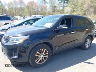 2014 Kia Sorento LX with VIN 5XYKTDA69EG425180, listed as a IAAI auction lot 42125882 with 194,319 mi miles. Bid and sale history available at carsss.com. Image 2.