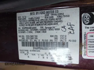 2011 Ford Fusion SE with VIN 3FAHP0HAXBR160083, listed as a IAAI auction lot 41964198 with 114,552 mi miles. Bid and sale history available at carsss.com. Image 9.