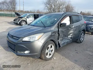 2014 Ford Escape SE with VIN 1FMCU9GX1EUD07536, listed as a IAAI auction lot 41853336 with 134,205 mi miles. Bid and sale history available at carsss.com. Image 16.