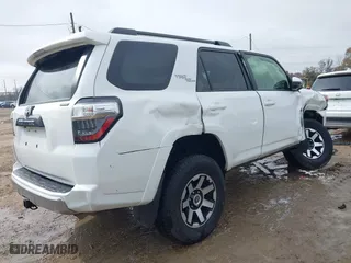 2022 Toyota 4Runner TRD Off Road with VIN JTEPU5JR2N5978258, listed as a IAAI auction lot 41441475 with 80,395 mi miles. Bid and sale history available at carsss.com. Image 4.