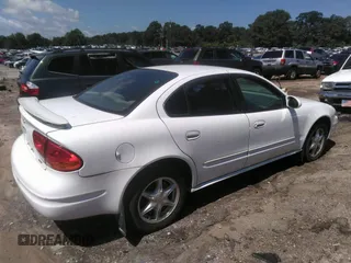 2000 Oldsmobile Alero GL2 z VIN 1G3NL52E4YC403539, wystawiony jako IAAI lot #42313033 z przebiegiem Nie podano mil oraz . Historia ofert i sprzedaży dostępna na DreamBid. Obrazek 4.