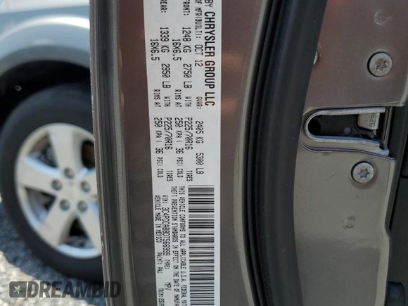 2013 Dodge Journey American Value with VIN 3C4PDCAB8DT566999, listed as a Copart auction lot 61361315 with 183,897 mi miles and Salvage title. Bid and sale history available at DreamBid. Image 13.