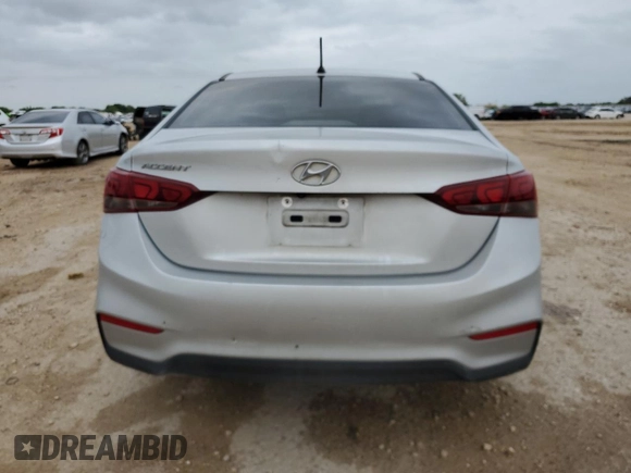 2021 Hyundai Accent SE с VIN 3KPC24A63ME131888, выставлен на аукционе Copart как лот 54426265 с пробегом 124 523 миль миль и Списание • Salvage title. История ставок и продаж доступна на DreamBid. Изображение 6.