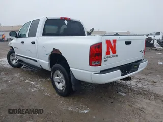 2003 Dodge 1500 SLT z VIN 1D7HU18N93J621948, wystawiony jako IAAI lot #41448520 z przebiegiem 200 091 mil mil oraz . Historia ofert i sprzedaży dostępna na DreamBid. Obrazek 3.