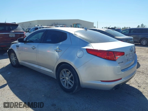 2013 Kia Optima LX z VIN KNAGM4A70D5414844, wystawiony jako IAAI lot #41774246 z przebiegiem 180 332 mil mil oraz . Historia ofert i sprzedaży dostępna na DreamBid. Obrazek 3.