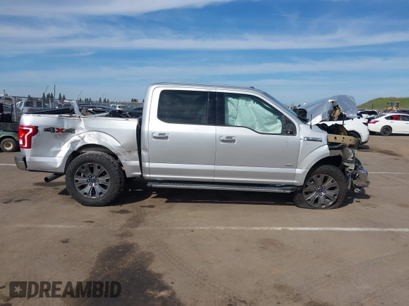 2015 Ford F-150 XLT with VIN 1FTEW1EG3FKD37310, listed as a IAAI auction lot 41681029 with 145,069 mi miles. Bid and sale history available at carsss.com. Image 14.