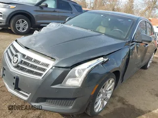 2014 Cadillac ATS Luxury AWD z VIN 1G6AH5RX6E0140302, wystawiony jako IAAI lot #41843454 z przebiegiem 125 388 mil mil oraz . Historia ofert i sprzedaży dostępna na DreamBid. Obrazek 6.