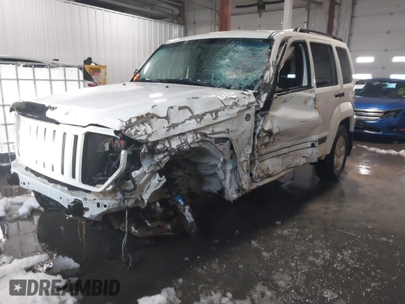 2010 Jeep Liberty Sport with VIN 1J4PN2GK4AW182488, listed as a IAAI auction lot 41312146 with 217,617 mi miles. Bid and sale history available at carsss.com. Image 2.
