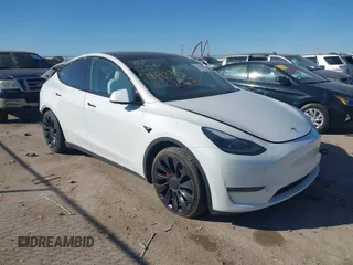 2023 Tesla Model Y Performance with VIN 7SAYGDEF1PF864976, listed as a IAAI auction lot 41667676 with Not Provided miles and . Bid and sale history available at DreamBid. Image 1.