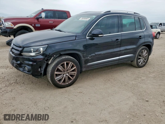 2012 Volkswagen Tiguan SE z VIN WVGAV7AX2CW575871, wystawiony jako Copart lot #58050865 z przebiegiem 96 569 mil mil oraz Szkody całkowita. Historia ofert i sprzedaży dostępna na DreamBid. Obrazek 1.