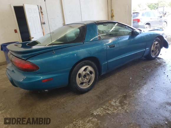 1995 Pontiac Firebird Firebird with VIN 2G2FS22S7S2240523, listed as a Copart auction lot 57970545 with 119,682 mi miles and Salvage title. Bid and sale history available at DreamBid. Image 3.