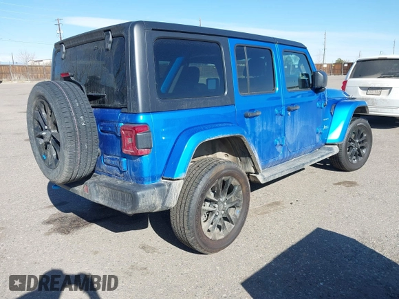2023 Jeep Wrangler Sahara z VIN 1C4JJXP60PW513969, wystawiony jako IAAI lot #41766631 z przebiegiem 34 819 mil mil oraz . Historia ofert i sprzedaży dostępna na DreamBid. Obrazek 4.