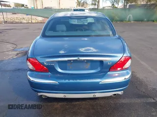 2002 Jaguar X-Type with VIN SAJEA51C42WC11103, listed as a IAAI auction lot 41699366 with 106,418 mi miles and . Bid and sale history available at DreamBid. Image 13.