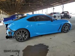 2023 Toyota GR86 with VIN JF1ZNBC13P8750048, listed as a Copart auction lot 67334774 with 35,653 mi miles and Salvage Title. Bid and sale history available at carsss.com. Image 3.