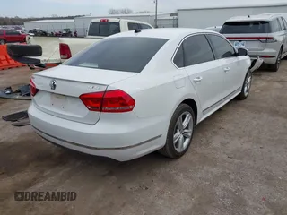 2013 Volkswagen Passat TDI SEL Premium with VIN 1VWCN7A3XDC118087, listed as a IAAI auction lot 41780198 with 305,872 mi miles. Bid and sale history available at carsss.com. Image 4.