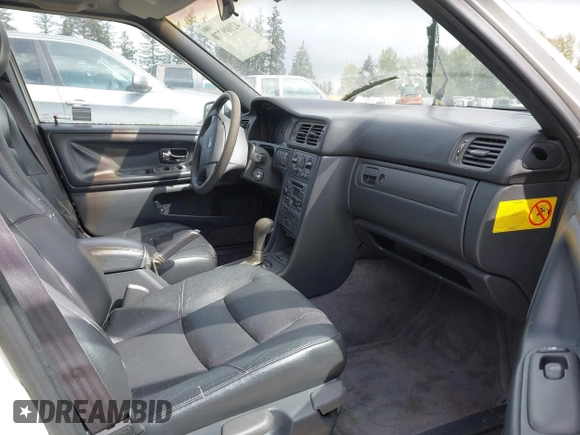 1999 Volvo S70 with VIN YV1LS55A4X1565064, listed as a IAAI auction lot 42009770 with 239,729 mi miles and . Bid and sale history available at DreamBid. Image 5.
